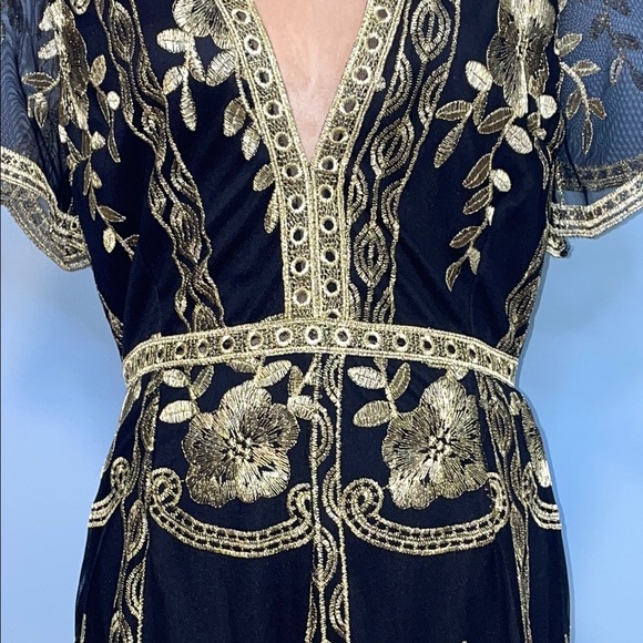 Elegant Black and Gold Romper with Modern Flair Size Medium - Picture 3 of 12